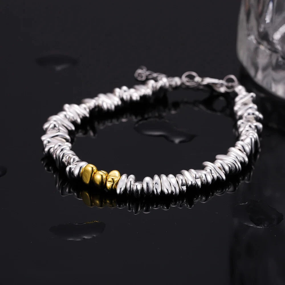 dual-tone black agate bracelet featuring silver-plated details